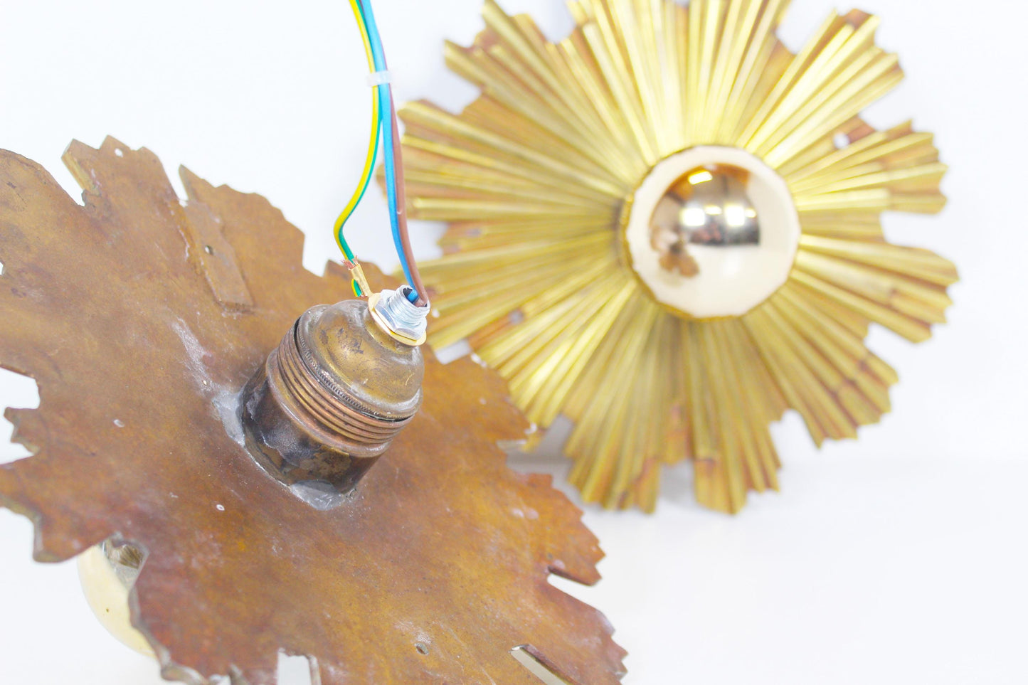 Set of solid bronze 1950s Sunburst wall lamps